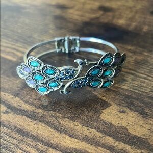 Elegant Silver and Blue Peacock Bracelet